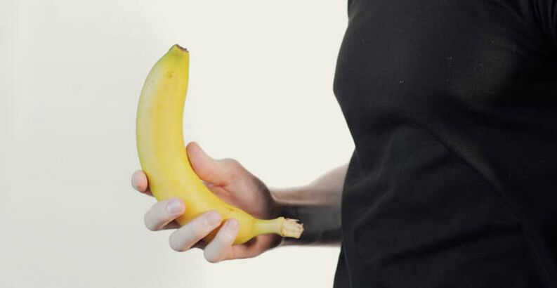 Massage to enlarge the penis with the example of a banana. 